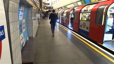 Victoria Line Train Arriving At And Departing From Kings Cross St