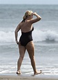 Kate Winslet makes waves in plunging black swimming costume | Daily ...
