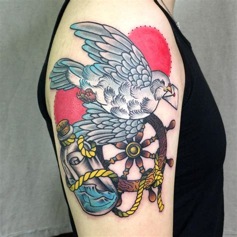 This is the famous symbol for peace where a dove carries a small twig of olive leaves and flies towards something. 75+ Dove Tattoo Designs and Symbolic Meaning - Peace ...