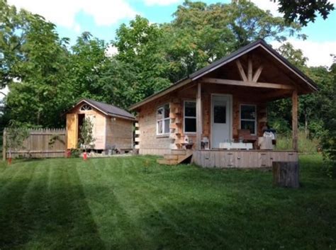 Backyard storage sheds and mini barns, and michigan rustic log cabins Amish-built Tiny Cottage