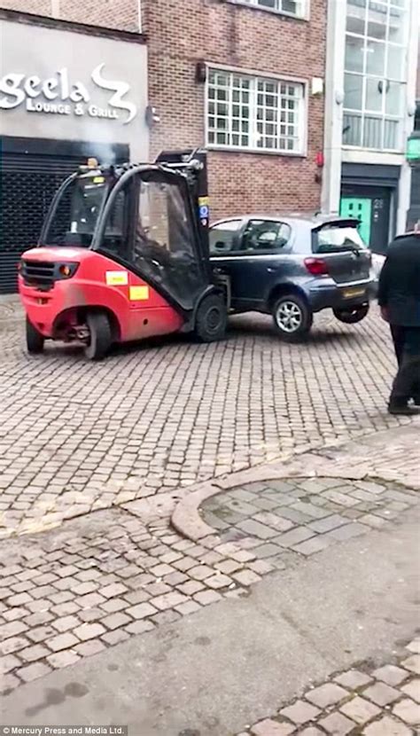 poorly parked birmingham car  moved   fork lift