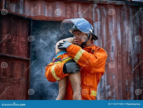 Firefighters Save The Boy From Burnt Place Stock Photo Image Of