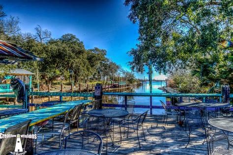 this secluded waterfront restaurant in mississippi is one of the most magical places you ll ever eat