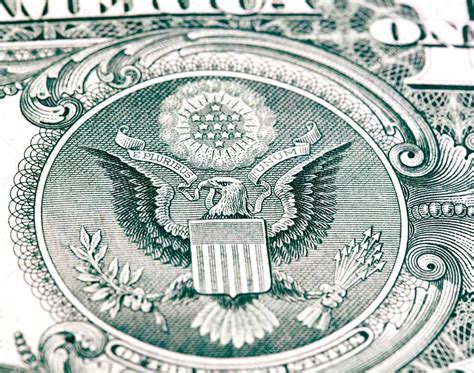 Eagle In Dollar Bill — Stock Photo © Pakhay 23921737
