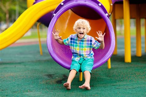 Child On Playground Kids Play Outdoor Stock Image Image Of Cheerful
