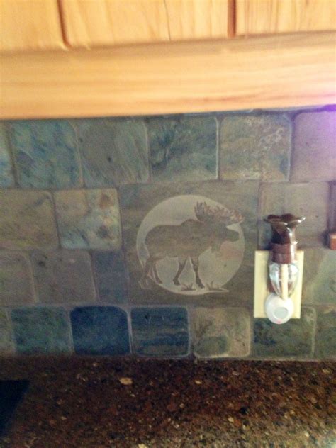Today's kitchen backsplashes are as decorative as they are functional. the tile backsplash in the kitchen at our cabin; it's got ...