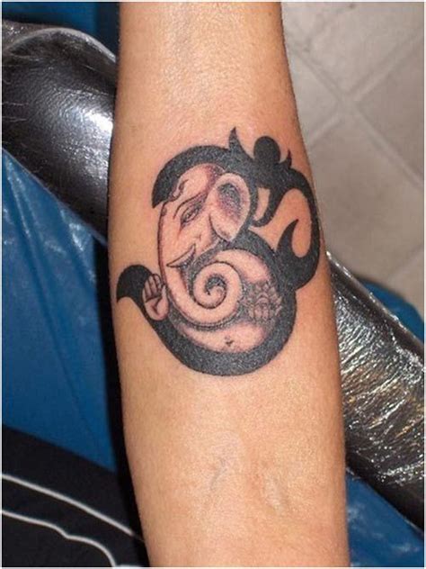 You can also try om tattoo design with trishul of lord shiva. 10 Devotional Om Tattoo Designs
