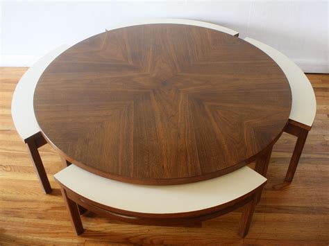 The round table was in camelot, the castle where king arthur and his knights lived. Mid century modern round game coffee table with 4 hidden ...