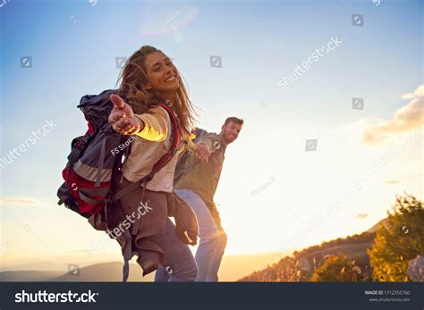People Helping Each Other Hike Mountain Stock Photo 1712355760