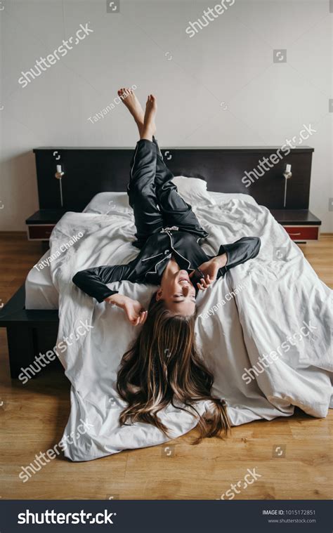 Young Beautiful Woman Lying Upside Down Stock Photo 1015172851