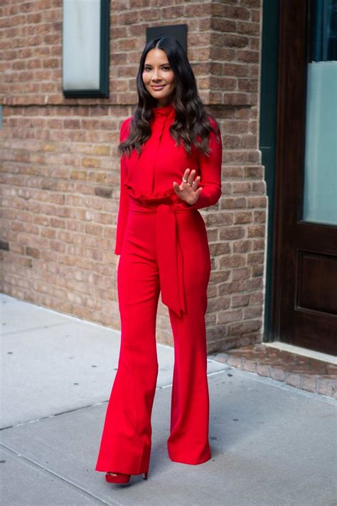 Olivia Munn Looks Striking In Red While Visiting The Daily Show With