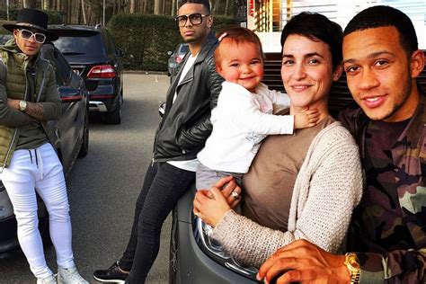 Memphis Depay Wife - Memphis Depay Puffs On A Cigar As He Strolls