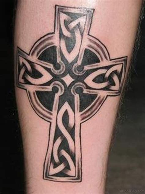 The elements used alongside the tattoo should help in enhancing the actual emotions expressed through the tattoo. 55 Antic Cross Tattoos For Leg