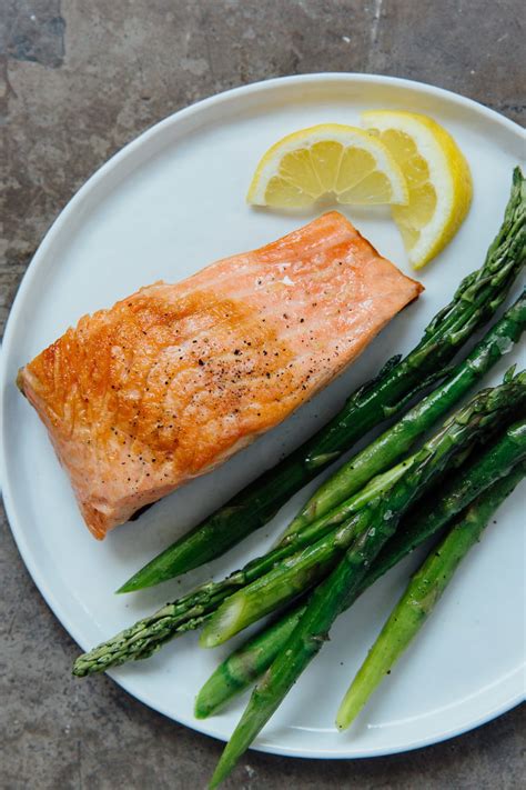 Season salmon with salt and pepper. How To Cook Perfect Salmon Fillets | Kitchn
