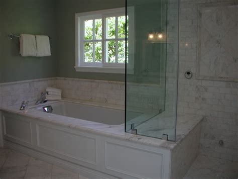 Share your thoughts in comments below. What is the height of the tub backsplash and the surround?