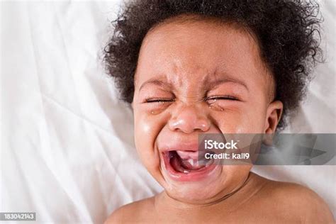 Face Of Crying African American Baby Stock Photo Download Image Now