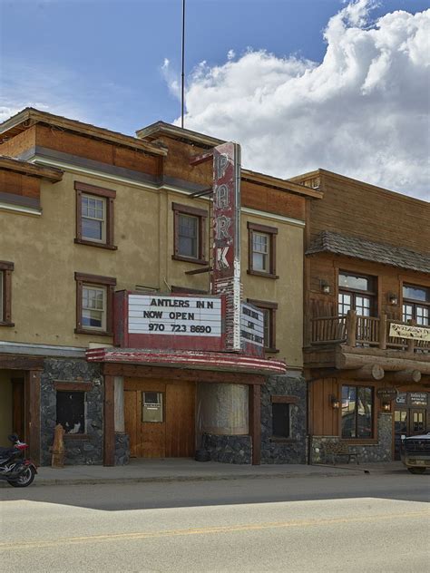 Law enforcement officers speak with colorado gov. The old Park movie theater in Walden, Colorado, was closed ...