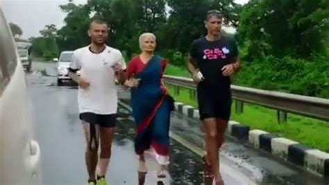 Watch Milind Somans 76 Yr Old Mom Runs With Him Barefoot Wearing A Sari