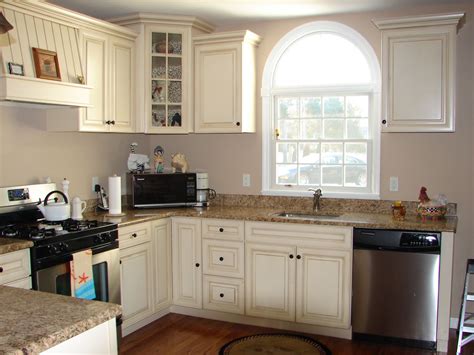 Painted kitchen cabinets in sherwin williams' dorian gray. Paint Colours For Kitchen Walls With Cream Cabinets ...