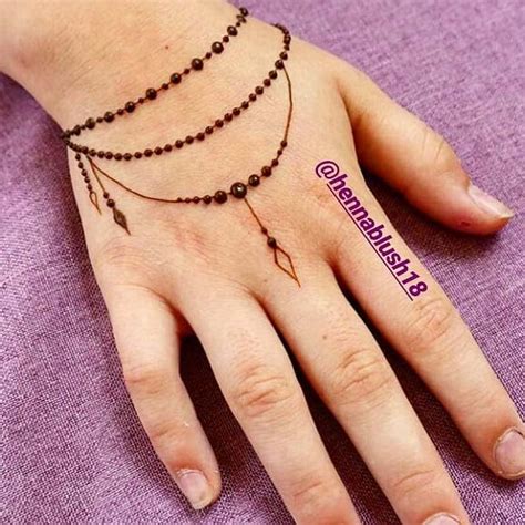 Awesome three henna tattoo design for wrist. 23 Simple Henna Designs That Are Easy to Draw | Page 2 of ...