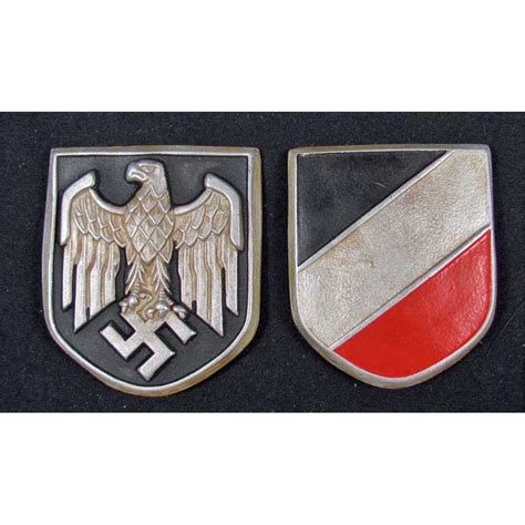 Able to do the best and the worst. SET OF 2 GERMAN NAZI BADGES FOR AN SS HELMET
