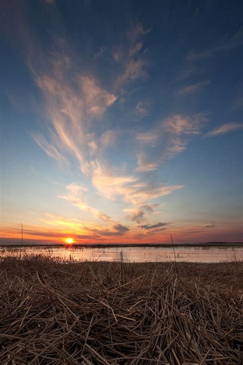 Sunset Over The Shoal Lakes Area North Of Woodlands Manitoba Photo
