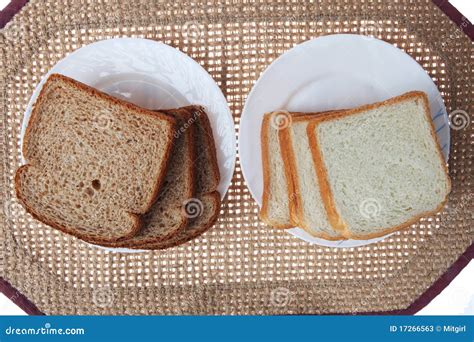 Whole Wheat And White Breads On Plates Stock Image Image Of Loaf