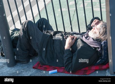 Homeless Man Sleeping Rough Outside A Melbourne Station Stock Photo Alamy
