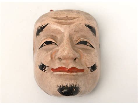 Masque, festival or entertainment in which disguised participants offer gifts to their host and then join together for a ceremonial dance. Masque de nô théâtre bois polychrome homme Gigaku O-beshimi Edo Japon XIXème