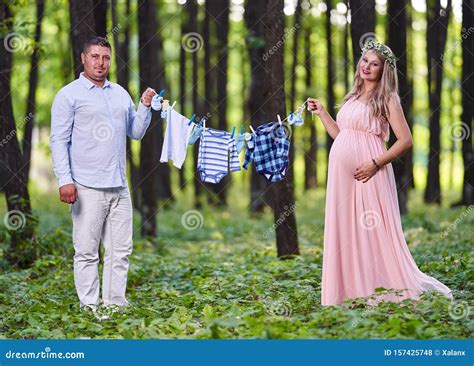 Pregnant Wife And Her Husband Outdoor Stock Photo Image Of Cheerful
