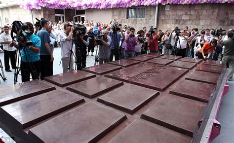 If you take a look at a globe or a map of the world, it's not too hard to find the largest country, russia. And the country with the world's biggest chocolate bar is ...