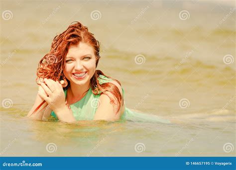 Redhead Woman Posing In Water During Summertime Stock Image Image Of