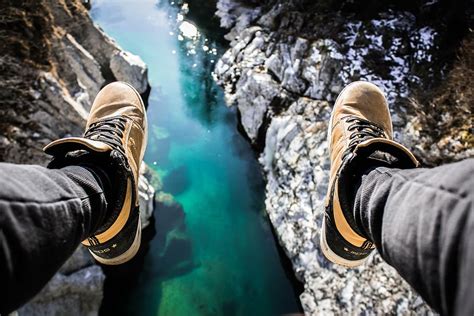 Person Sitting Cliff Nature Landscape People Man Sneakers Shoes