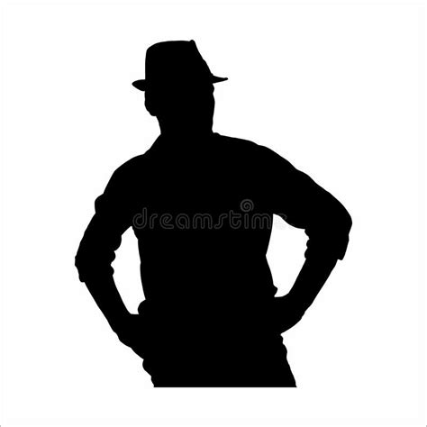 Silhouette Of A Man Wearing A Fedora Hat While Posing For A Photo