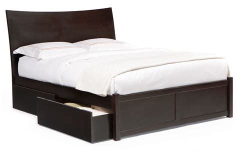 It has one drawer on each side of the bed near the footboard, each of which have flush inlaid handles. Milano Platform Bed - Flat Panel Footboard
