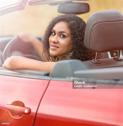 Beautiful Brazilian Woman Driving Convertible Stock Photo Download