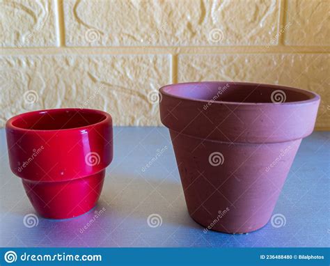 Tiny Ceramic Red Pot With Miniature Terracotta Pot Stock Photo Image