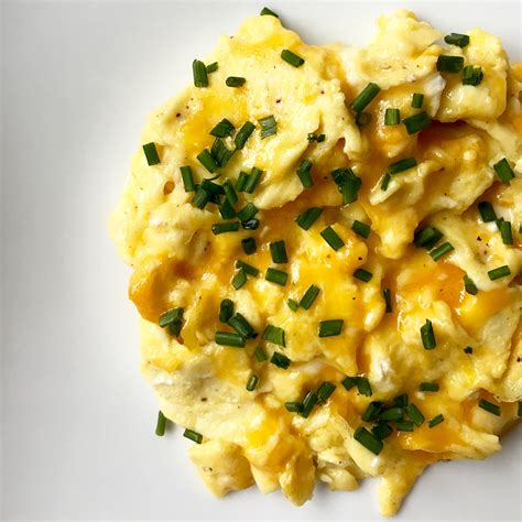 How To Make Cheesy Scrambled Eggs Popsugar Food