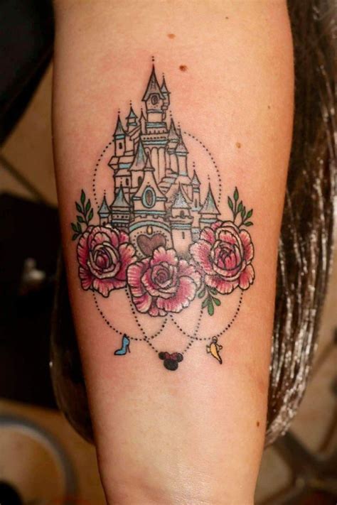 A Castle Tattoo With Roses On The Arm