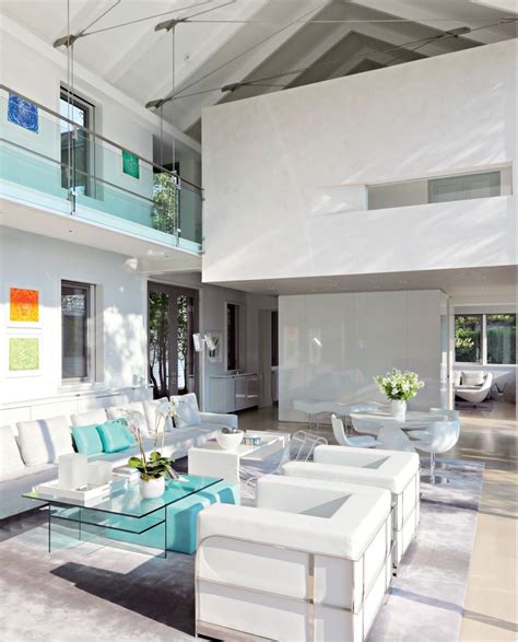 A crisp, matte white living room is pristine, elegant, and timeless. All White Living Room Design Ideas