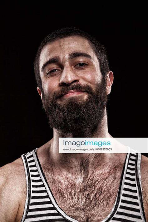 Emotional Portrait Of Beardy Georgian Man With A Hairy Chest Closeup