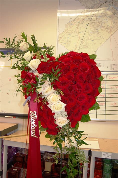 Order now & send flowers today family spray broken wheel Grave decoration, Pinterest ...