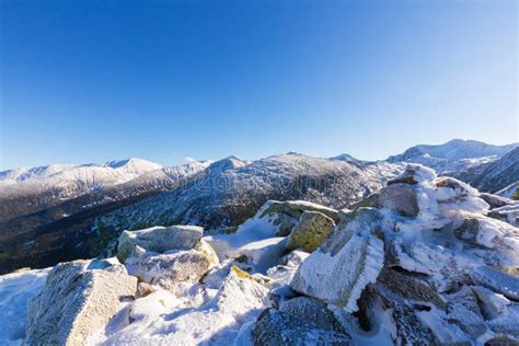 Bright Winter Scenery In The Mountains With Frost And Rocks Covered