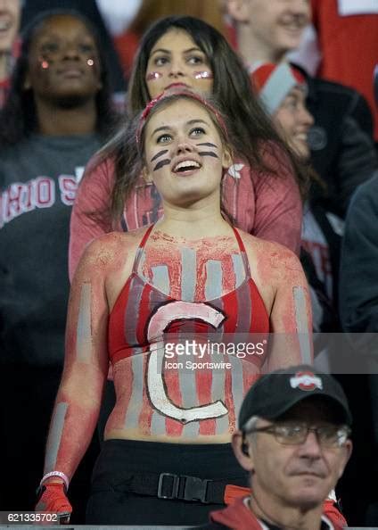 Female Ohio State Buckeyes Fan During The Forth Quarter Of The Game
