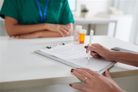 Female Patient Filling Medical Form Stock Photo Image Of Women