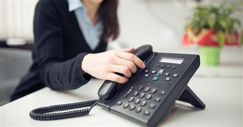 Young Business Woman Answering Phone Callgood Newscustomer Service