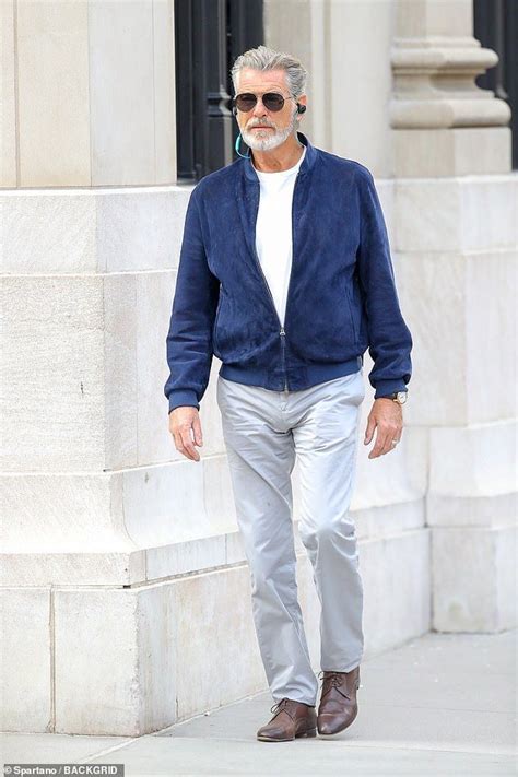 pierce brosnan ditches the dye another day and embraces his natural grey locks and bushy beard