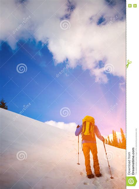 Mountain Climber Walks On A Snowy Slope Stock Image Image Of