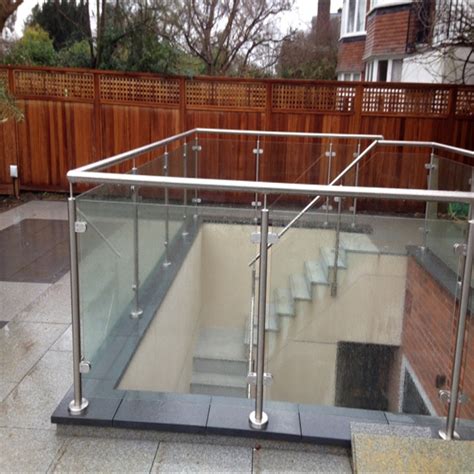 Water feature with stainless steel ball on stele (column). China High Outdoor Glass Terrace Railing / Glass ...