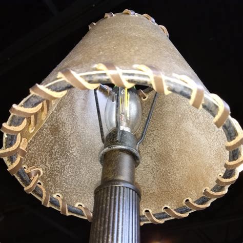 Different styles and colors of hand made rawhide lamp shades provided by www.missiondelrey.com. Small Bronze Lamp Rawhide Shade 22"H | Lamp Shade Pro